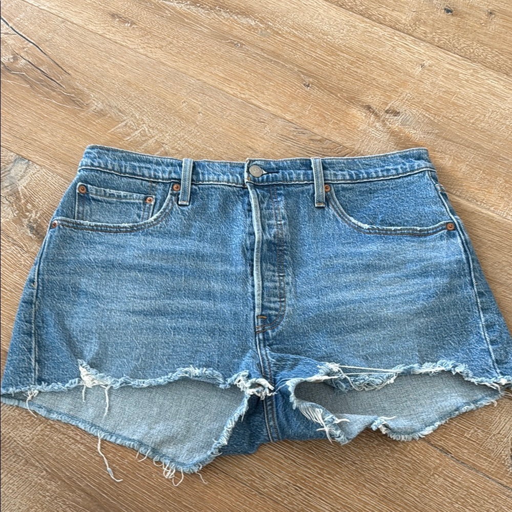 Distressed Levi's Blue Jean Shorts with Frayed Hem